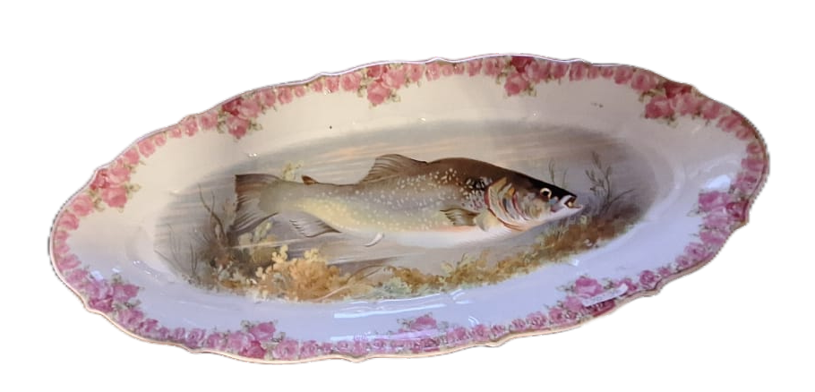 a long dish with a fish drawing on it